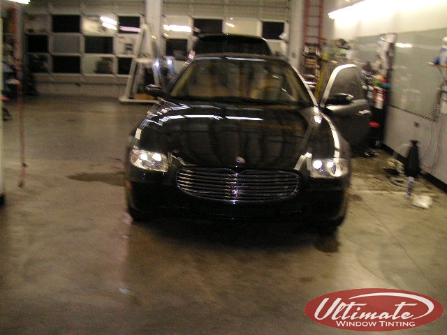 black sedan with window tint