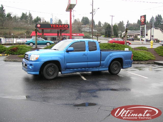 blue tacoma with window tint